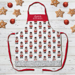Red Christmas Nutcracker Pattern Apron<br><div class="desc">A simple pattern of a red,  black,  and silver Christmas nutcracker decorates this apron. Makes a fun Christmas gift. Personalise it with your name this Christmas season.. Designed for you by Blackberry Boulevard.</div>
