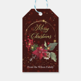 Red Christmas tag with holly wreath