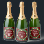 Red Christmas Wreath Custom Company Logo Party Sparkling Wine Label<br><div class="desc">This beautiful company Christmas champagne label is custom made with your business logo within a festive holly berry wreath with gold garland wrapping on a red background. Contemporary holiday labels for your client or corporate employee presents.</div>