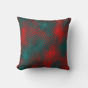 Red crisscrossing scratches over charred cyan      cushion