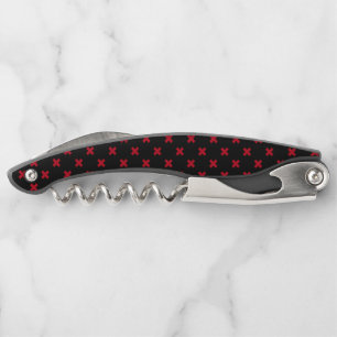 Red cross stitches on black corkscrew