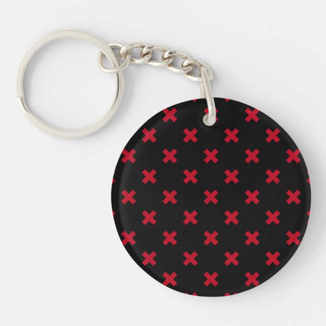 Red cross stitches on black key ring (Front)