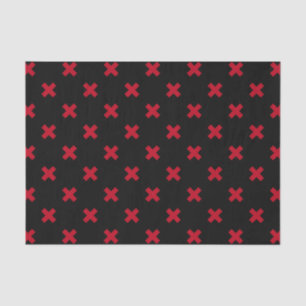 Red cross stitches on black tissue paper