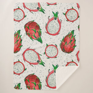 Red dragon fruit on off white sherpa blanket