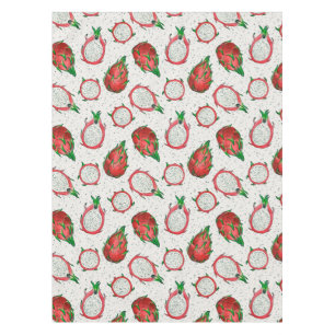 Red dragon fruit on off white tablecloth