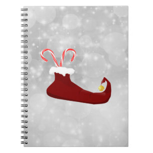 Red Elf Shoe with Candy Canes on Bokeh Background Spiral Notebook