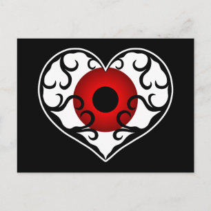 Red eyeball in heart postcard