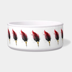 Red feather pen with gold nib