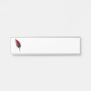 Red feather pen with gold nib door sign