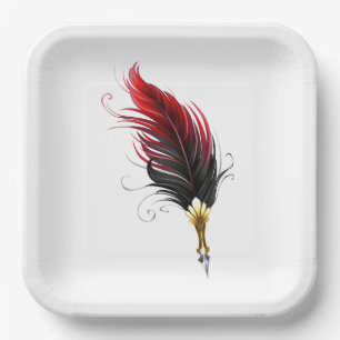 Red feather pen with gold nib paper plate