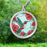 Red Flower Hummingbird Silver Plated Necklace<br><div class="desc">On this pretty necklace is a stunning image of a hummingbird next to a group of red flowers. Colours in the hummingbird are blue green and red, which complements the flower images and the light sky blue background. Elegant, bright, and colourful! Be sure to see the matching earrings and key...</div>