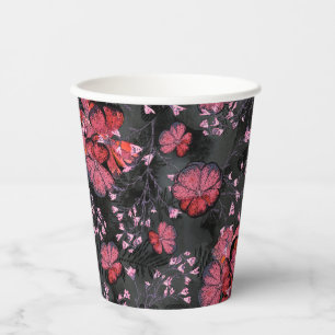 Red flowers on a black-grey background. paper cups