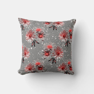 Red flowers on grey cushion