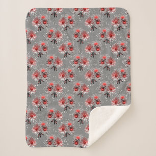 Red flowers on grey sherpa blanket