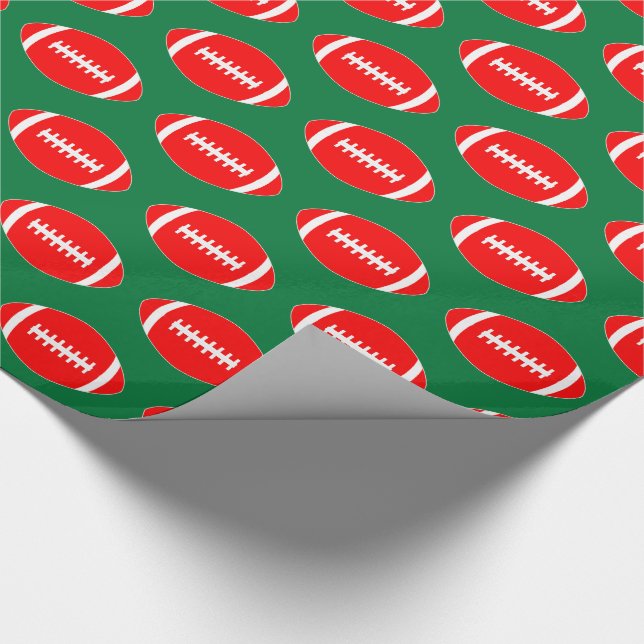 Red Footballs on Green Background Christmas Gift Wrapping Paper (Corner)