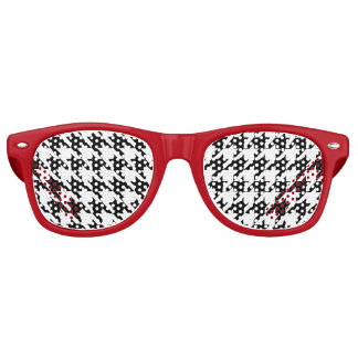 Red framed black and white houndstooth retro sunglasses