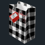 Red Gift Tag On Buffalo Plaid Medium Gift Bag<br><div class="desc">Red gift tag with a striped string bow on white-and-black buffalo plaid.
Names on the red tag can be edited</div>