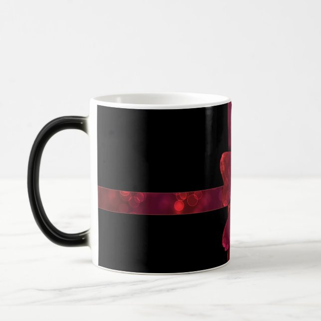 Red glitter bow and stars on black magic mug (Left)