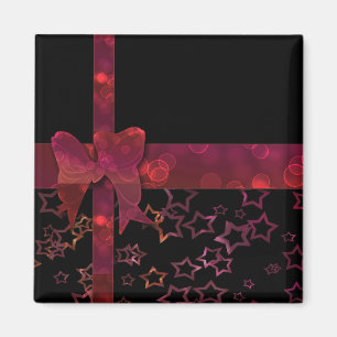 Red glitter bow and stars on black magnet