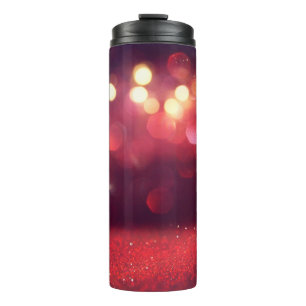 Red glitter vintage lights background. defocusedba thermal tumbler