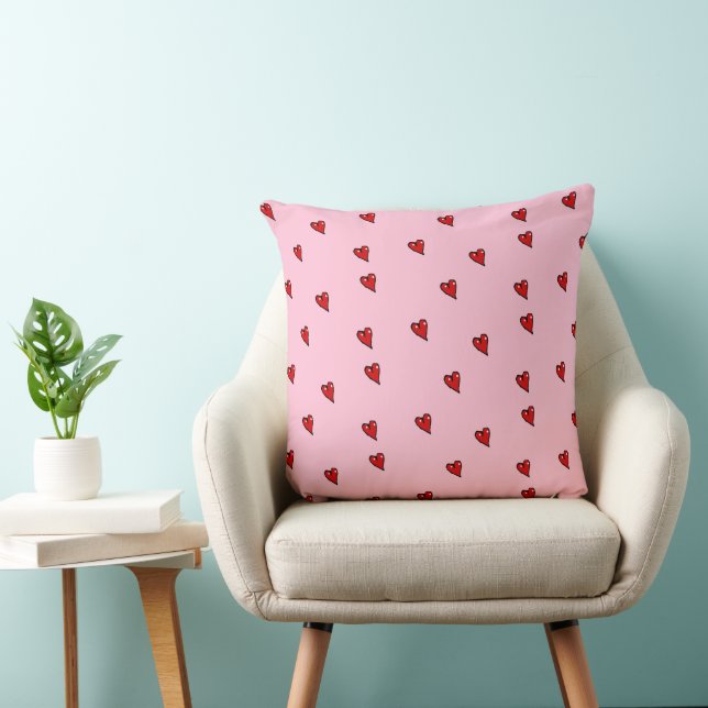 Red glossy hearts on pink cushion (Chair)