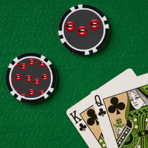 Red glossy lips on grey poker chips
