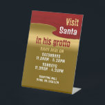 Red & Gold, Santa Claus Visitor Hours Pedestal Sign<br><div class="desc">This pedestal sign is perfect for anybody holding a visit Santa event. Displaying Santa's grotto and the opening hours,  it is perfect for both commercial and domestic events.</div>