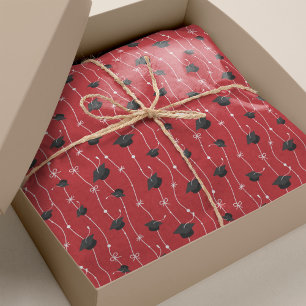 Red Graduation Caps and Ribbon Tissue Paper