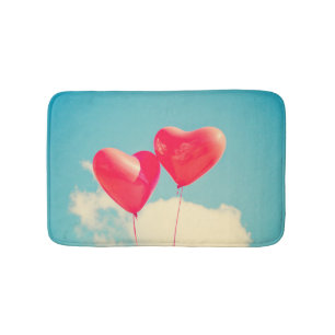 Red Heart Balloons Against Cloudy Sky Bath Mat