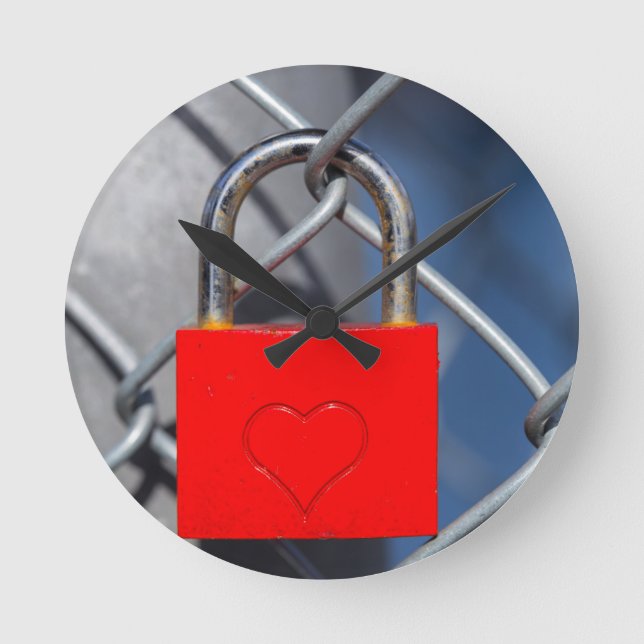 Red heart lock on fence round clock (Front)