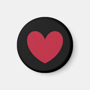 Red heart on black magnet