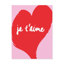 Red heart with je t’aime-text on pink background