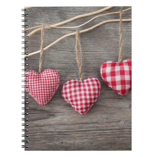 Red Hearts on Wooden Table Spiral Notebook (Front)