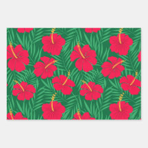Red Hibiscus Flowers on Green Tropical Leaves 