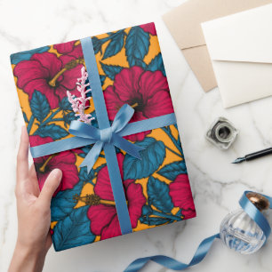Red hibiscus on orange wrapping paper