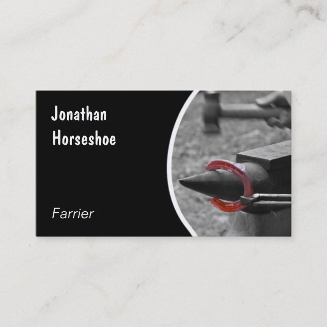 Red horseshoe hammered on an anvil business card (Front)