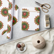 Red ladybug on red and green petals on white.