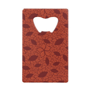 Red leaves pattern on orange