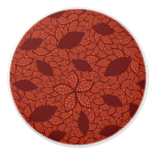Red leaves pattern on orange ceramic knob