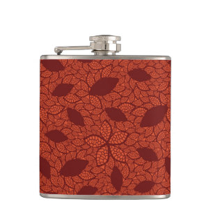 Red leaves pattern on orange hip flask