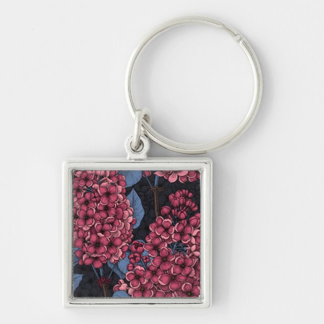 Red lilac on dark blue key ring (Front)