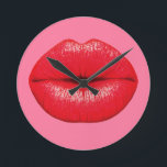 Red Lipstick big pop art lips on girly pink Round Clock<br><div class="desc">A design based on pop art of large red lips with lipstick supersized against a girly candy pink coloured background. The background colour can be customised and changed to any bright colour that would suit yout décor.</div>