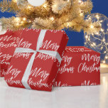 Red Merry Christmas Calligraphy Wrapping Paper<br><div class="desc">This elegant wrapping paper features the words "Merry Christmas" in brush font on a red background.</div>