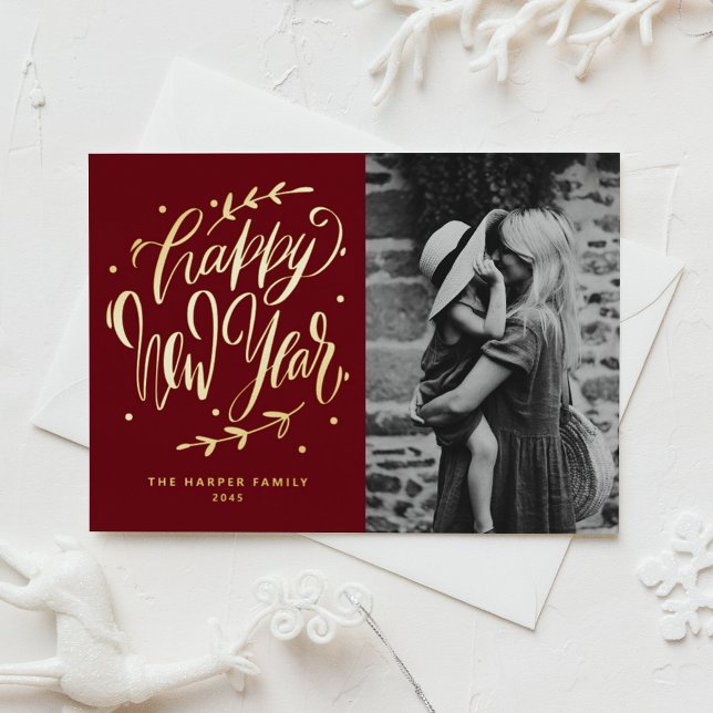 Red Modern Calligraphy and Wreath New Year Photo Foil Holiday Postcard (Burgundy photo Happy New Year postcard featuring modern calligraphy and wreath in gold foil.)