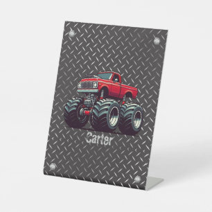 Red monster truck pedestal sign