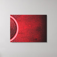 Red music speaker and sound waves