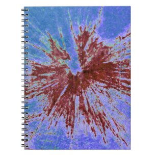 Red Paintball on Blue and Purple Spiral Notebook