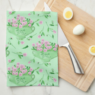 Red pansies green bowl and background tea towel