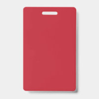 Red, pink, and orange garments hang side by side o