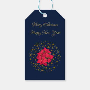 Red Poinsettia Plant on glittering starry blue sky Gift Tags
